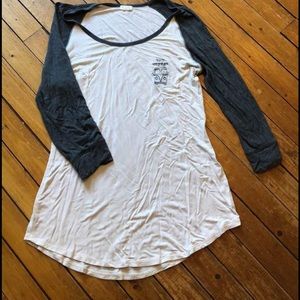 Garage quarter sleeve T-shirt. Light tan and grey. Bon voyage size M